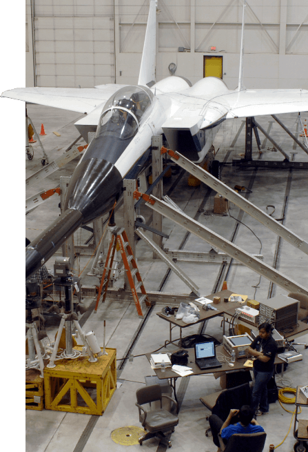 A fighter jet being worked on